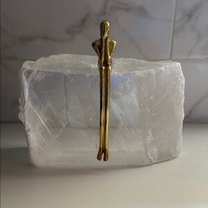 Gold Figurine on Crystal Block
